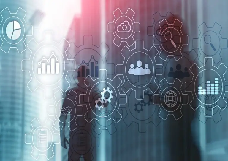 A person standing in front of a wall with gears and icons.