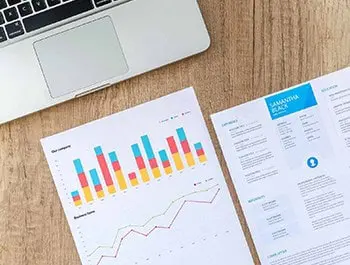 A bunch of graph kept on a wooden table